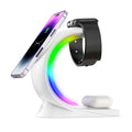 4-in-1 Wireless Charging Station with RGB lighting, charging a phone, smartwatch, and earbuds.