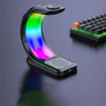 4-in-1 Wireless Charging Station with RGB lighting for efficient device charging.